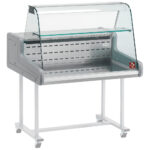 Refrigerated display counter - curved glass panel