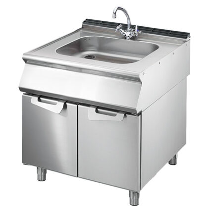 Sink on cabinet with doors