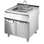 Sink on cabinet with doors