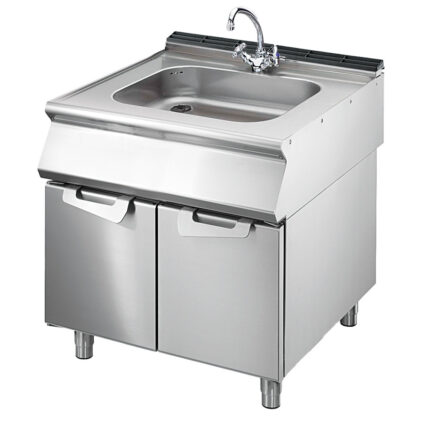 Sink on cabinet with doors